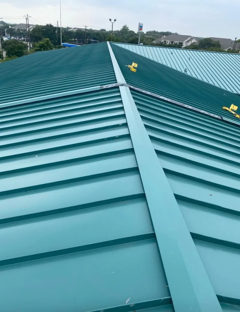 Green commercial metal roof ridge and valley for Metal Roof Repair in Creswell
